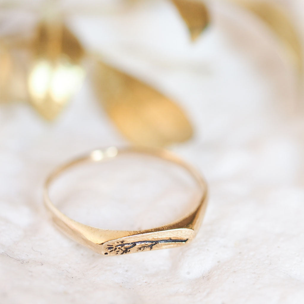 Thin 10K gold flower stackable signet